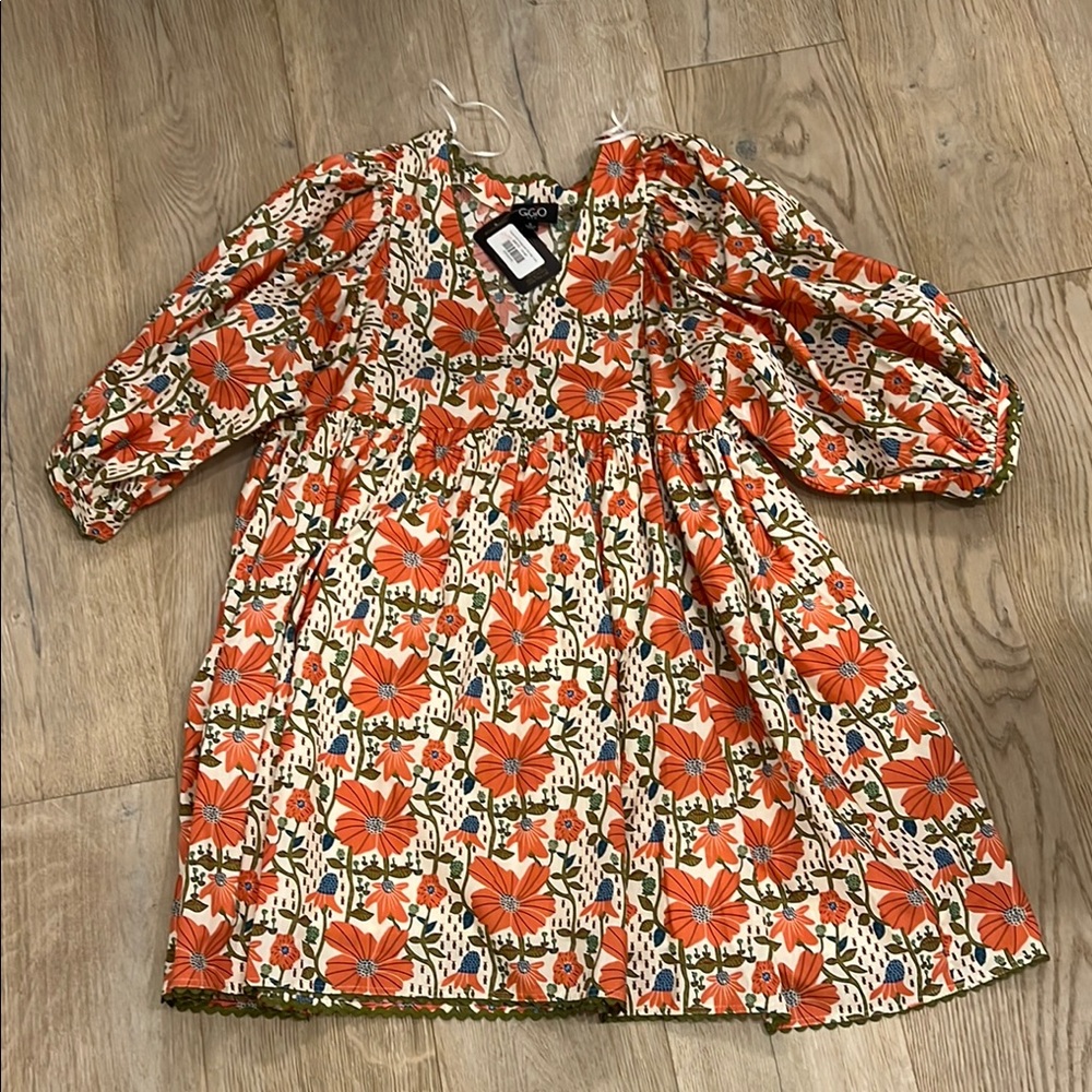 GiGio Floral Patterned Dress with Puff Sleeves and ric rac. Size small. New